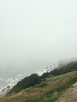 foggy cliff over the ocean