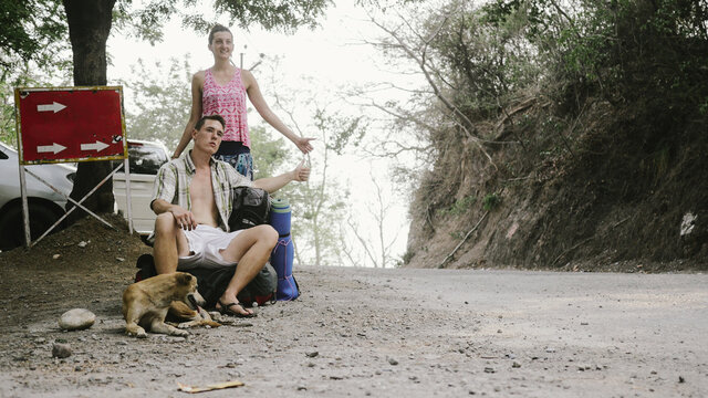 Couple hitchhiking in India