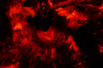 embers burn down in a hardwood fire - 380449653