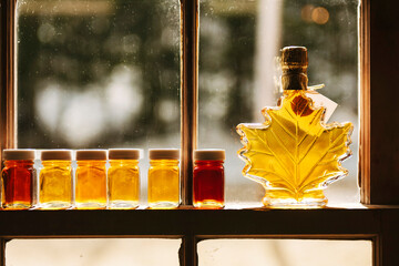 Maple Syrup Grade Display in Window of Sugar Shack