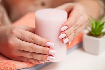 Fototapeta na wymiar The picture of female hands with perfectly done manicure.