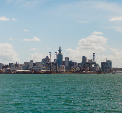 Views of Auckland city and famous tower from the water