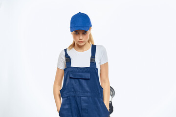 Woman in working uniform blue cap delivery courier delivery service