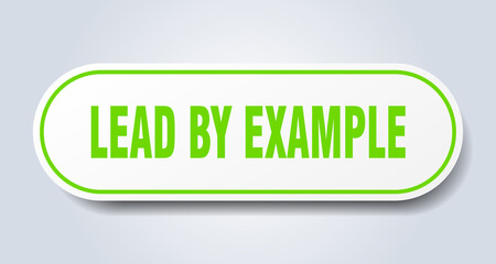 lead by example sign. rounded isolated button. white sticker