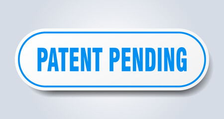 patent pending sign. rounded isolated button. white sticker