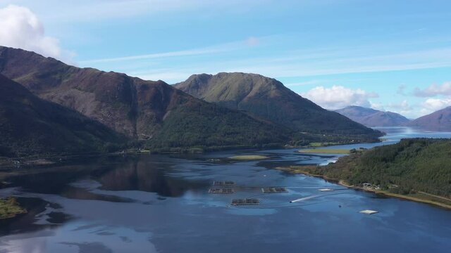 aerial view of loch linnhe in summer near duror and ballachulish and glencoe in the argyll region of the highlands of scotland showing blue water and green fertile coast line