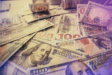 Multi exposure of forex chart drawing over us dollars bill background. Concept of financial success markets.