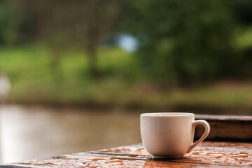 A cup of coffee in rainy day