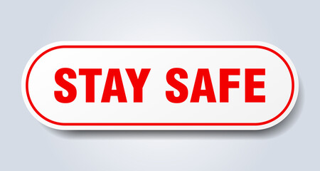 stay safe sign. rounded isolated button. white sticker