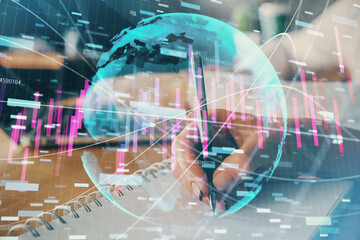 Fototapeta na wymiar Double exposure of forex chart drawing over people taking notes background. Concept of financial analysis