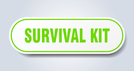 survival kit sign. rounded isolated button. white sticker