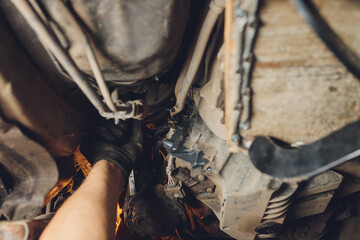 The iron gearbox of a car s transmission disassembly of the transmission chain and parts, repair.