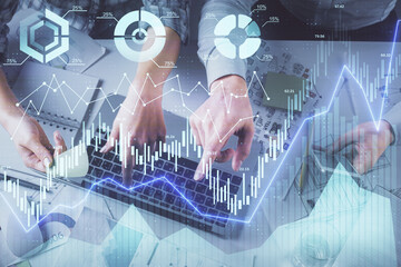 Double exposure of man and woman working together and forex graph hologram drawing. Financial analysis concept. Computer background. Top View.