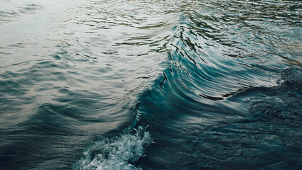 Small Wave in Deep Turquoise Water