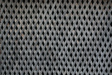 Wooden grill on a window