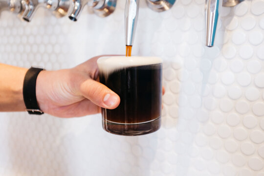 freshly poured beer at modern cafe pub