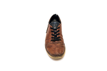Old dirty brown leather shoes on an isolated white background. Concept, second hand, hard work,...
