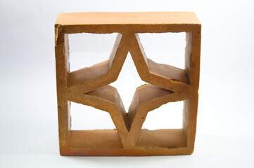 Brick with star shape and white background.