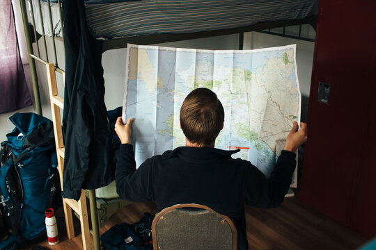 Young Man Looking At Map