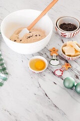 Ingredients for Homemade Chocolate Chip Cookies on a White Countertop with Christmas Decor