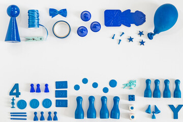 Collection of blue toys and game pieces