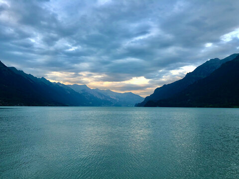 Mountains and lake with cloudy sky landscape