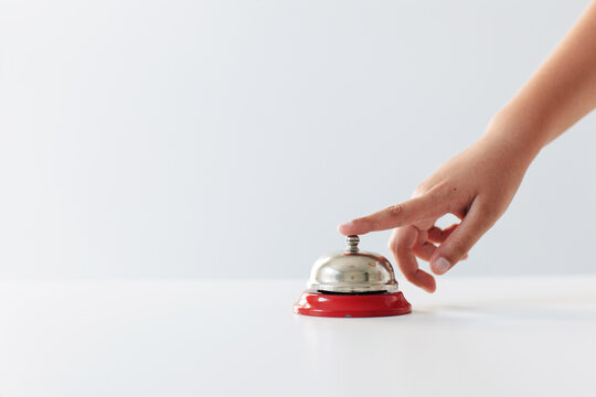 finger ringing a call bell