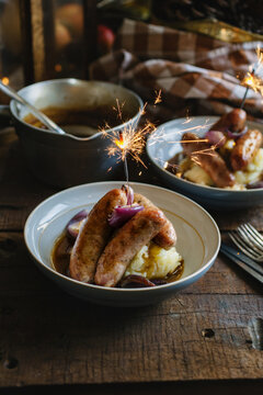 Bonfire night bangers and mash with rich onion gravy.