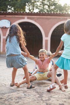 Group of children playing happy and action games