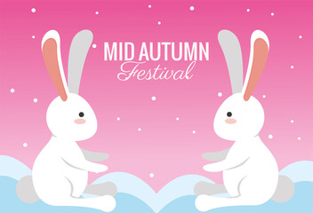mid autumn celebration card with rabbits couple in clouds