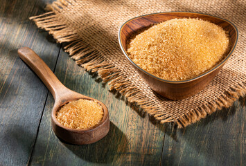 Fototapeta Saccharum officinarum - Organic brown sugar in the wooden bowl obraz