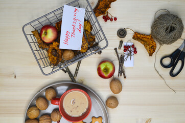 celebrate thanksgiving day, a cup of coffee with milk, a happy holiday, autumn decor and mood