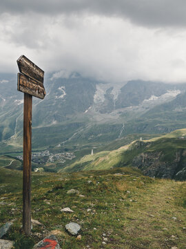 Wooden sign on the mountains