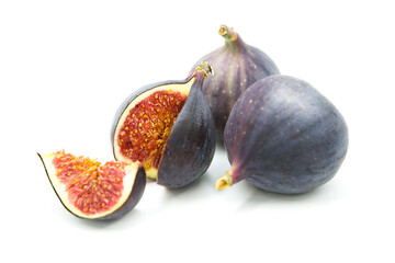 Ripe sweet fresh figs isolated on white background. Whole fruit and sliced	