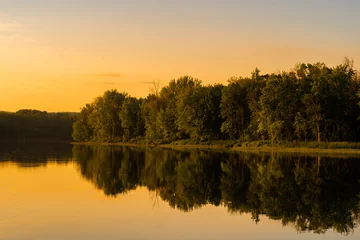 Vlies Fototapete Reflection Beautiful sunset landscape with  trees reflecting in a lake, in Quebec
