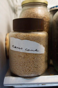 recycled jar holds stored cus cus