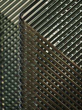 Closeup metal pattern texture created by stacked chairs