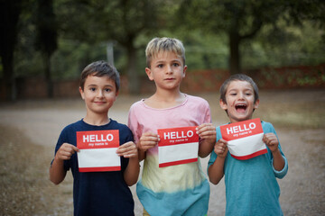 Three kids with napkins for introducing yourself