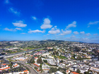 a stunning aerial shot of the beach front community, blue sky, clouds and deep blue ocean at South...