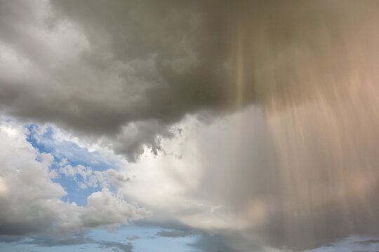 Dramatic sky with local rainfall