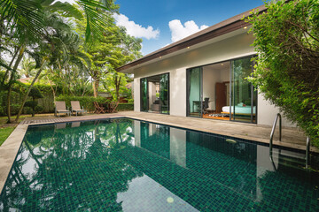 Fototapeta premium Exterior design of house, home and villa feature swimming pool, garden, terrace and decking
