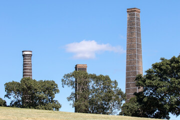 Old chimneys from brick works in Sydney Australia