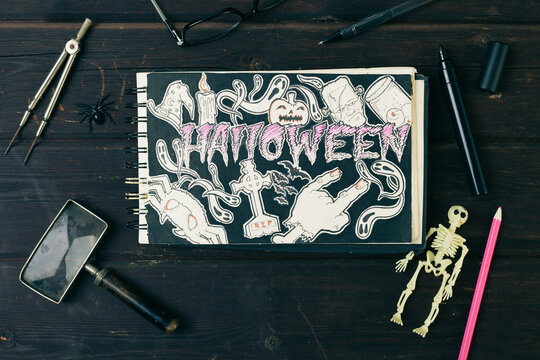 Halloween draw in a sketchbook.