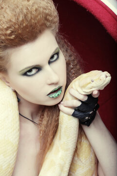 woman holding yellow Python