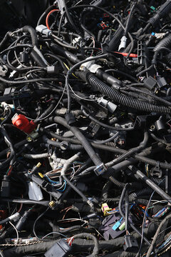 Collected and assorted parts at a car scrapyard