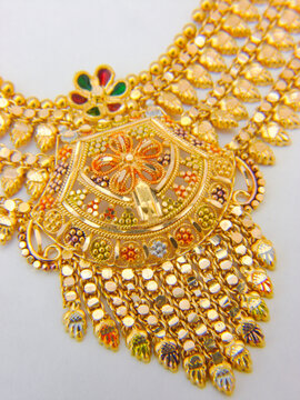 Isolated Indian gold necklace closeup
