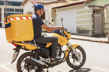 Fototapeta na wymiar delivery man on motorcycle
