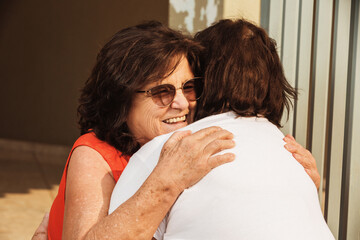 ladies friends hugging
