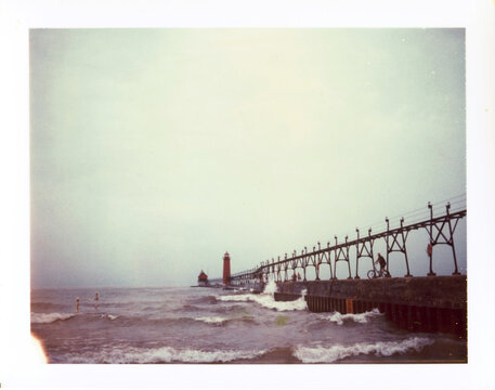 A Pier On A Cloudy Day Photographed On Expired Polaroid Peel Apart Film