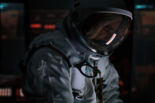 An Astronaut working inside his space shuttle